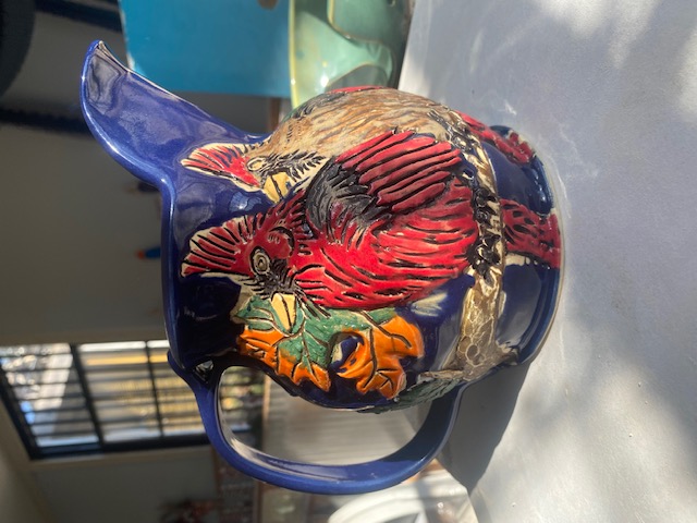 Blue glbaze Water Pitcher with hand carved pair of cardinals with fall leaves